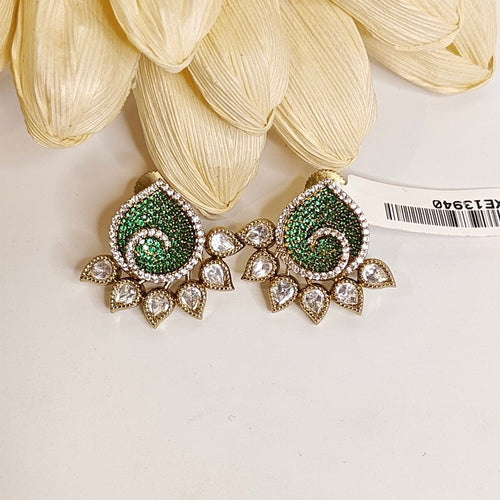 Aashi polki and CZ earrings in green