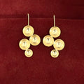 Tulika gold-polished brass danglers