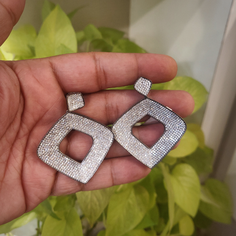 Charulata AD star earrings detail