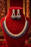Sapphire Royal AD necklace set on red velvet