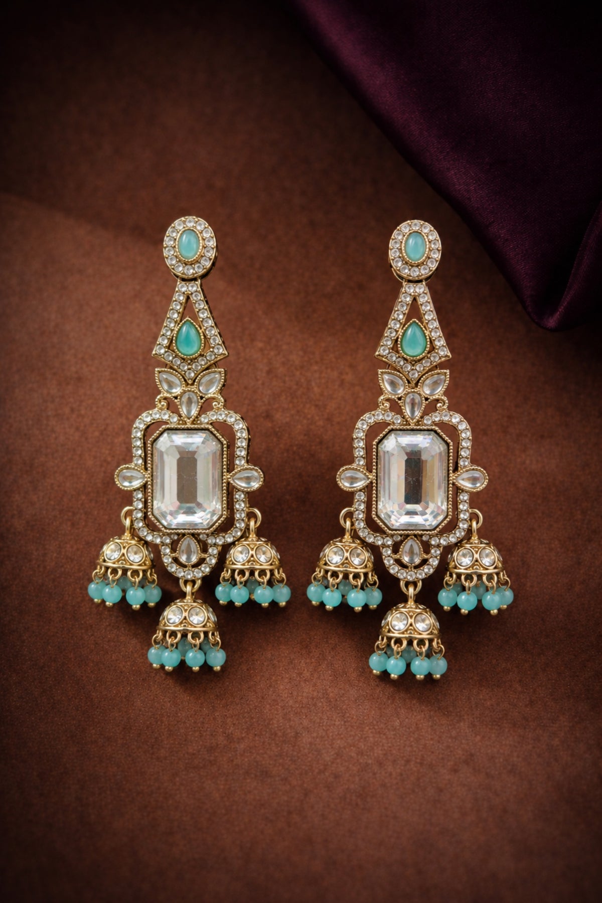 Quartz Royal AD jhumki earrings with turquoise beads