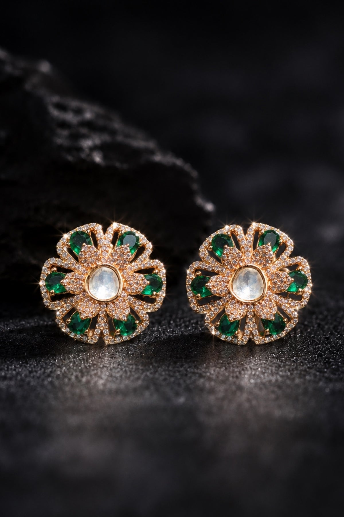 Flower AD and moissanite studs with emerald green stones