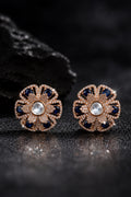 Flower AD and moissanite studs with sapphire blue stones