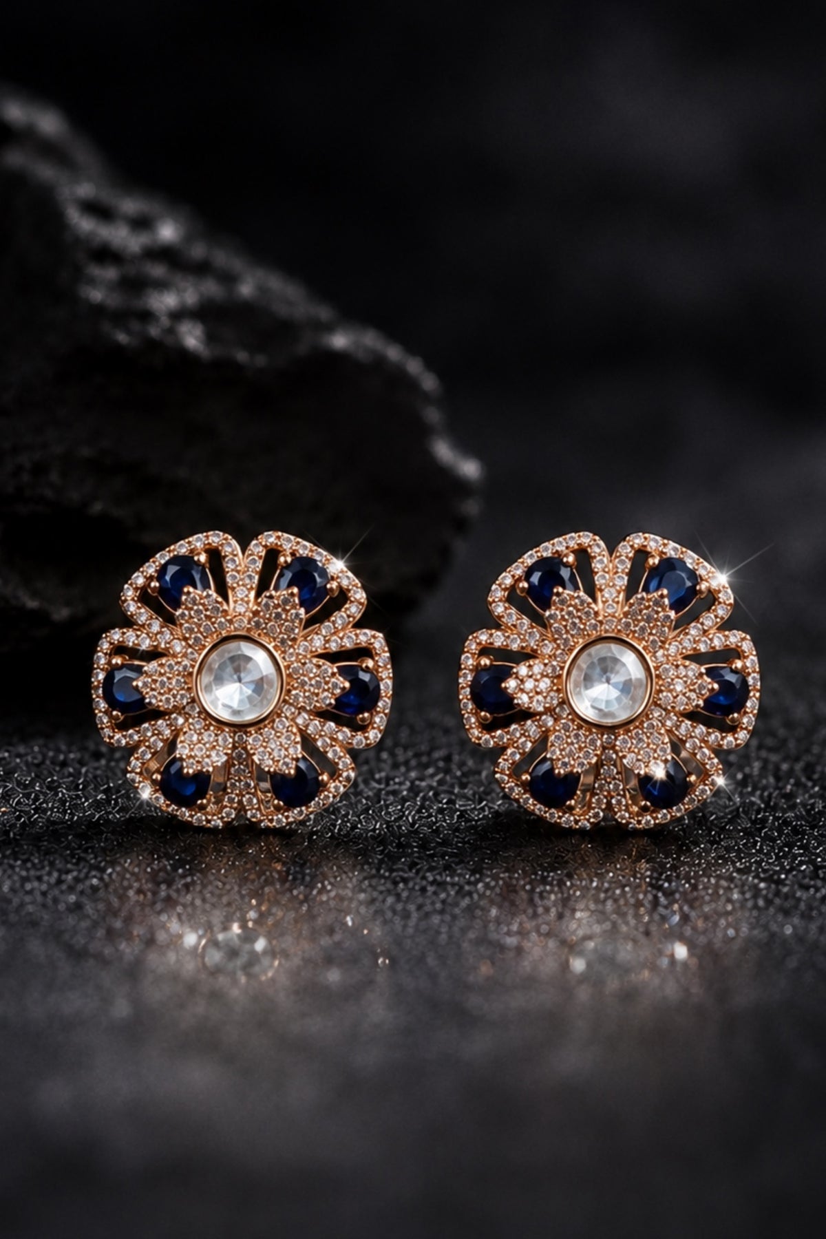 Flower AD and moissanite studs with sapphire blue stones