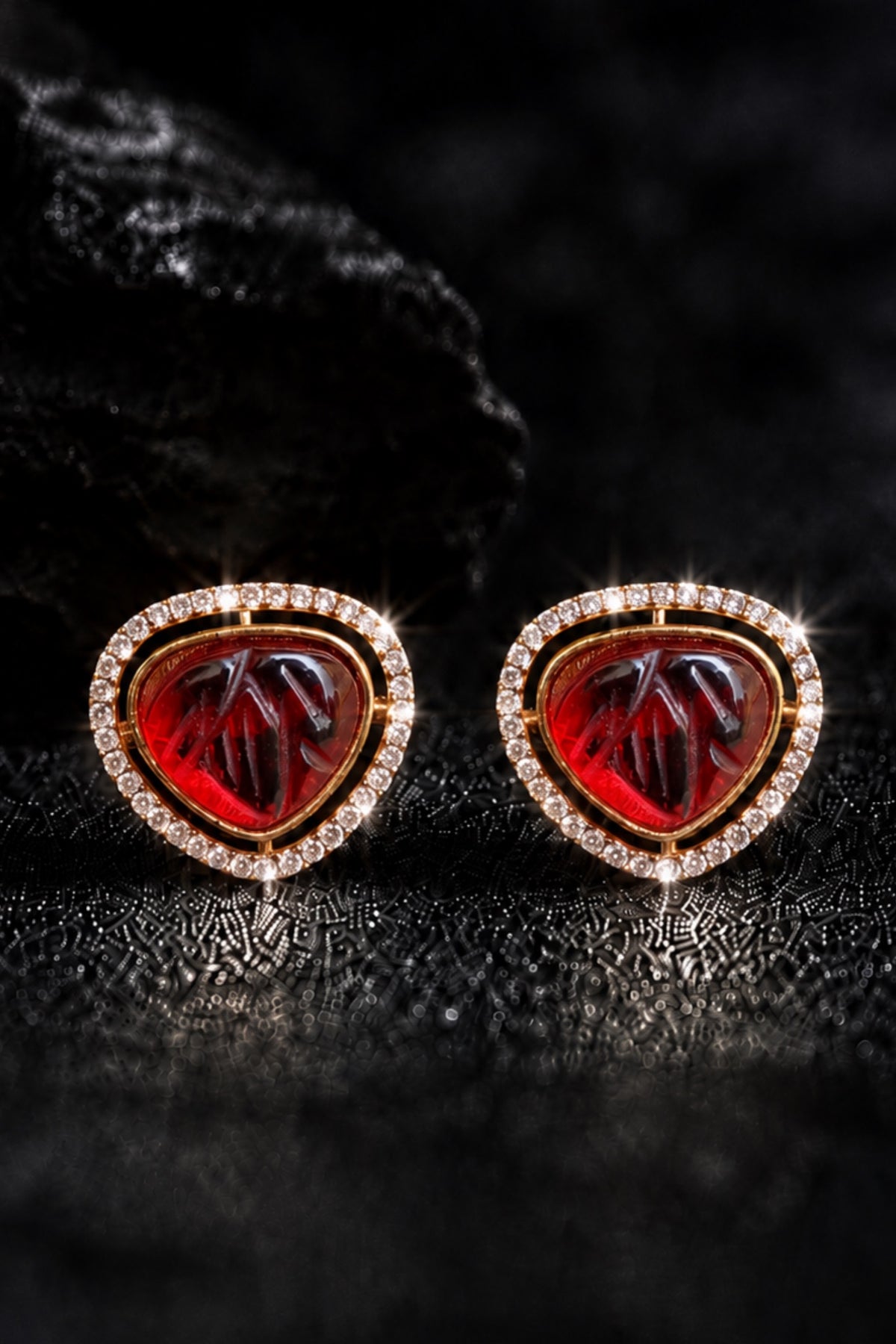Every Day AD studs with ruby red stone