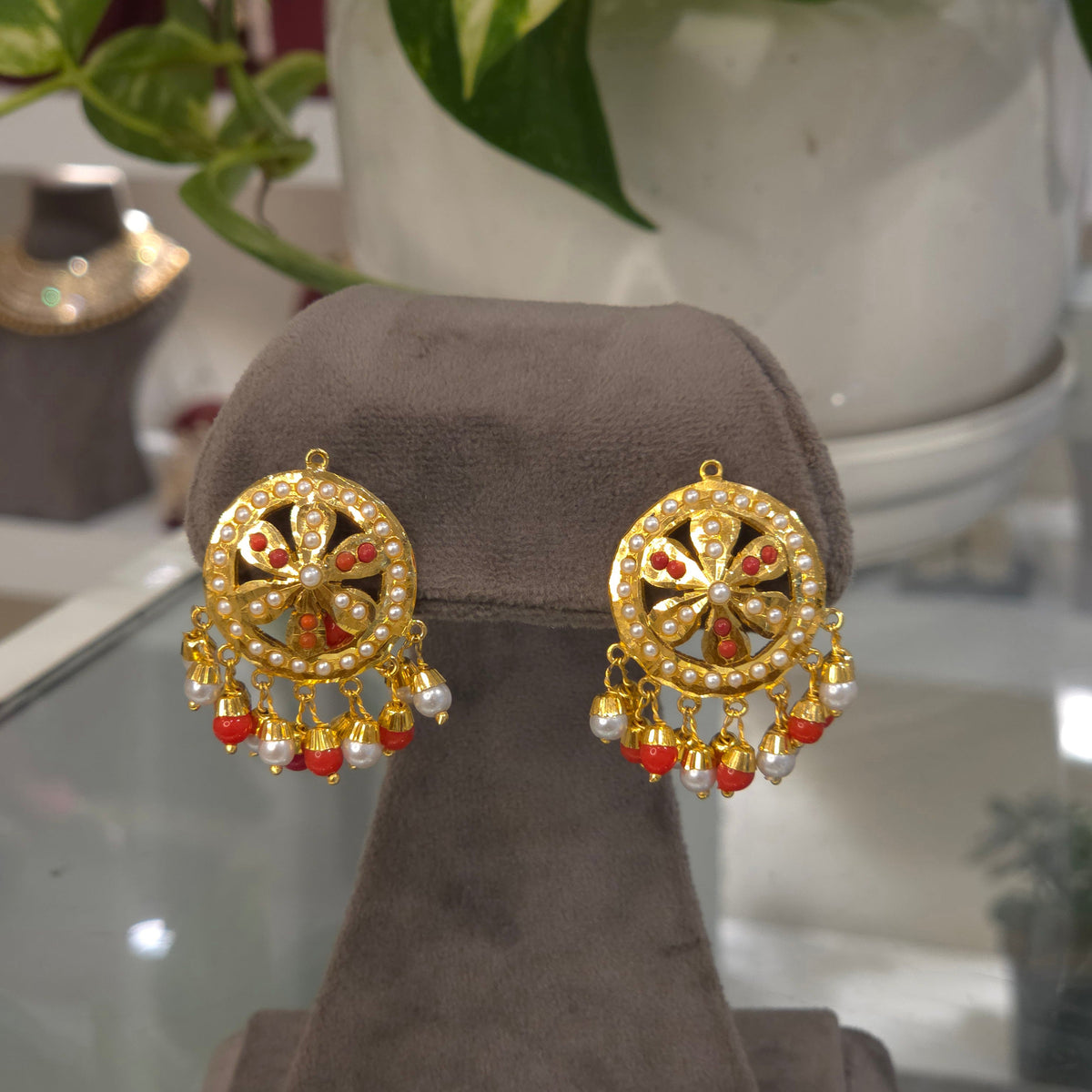 Manreet jadau earrings in gold and orange